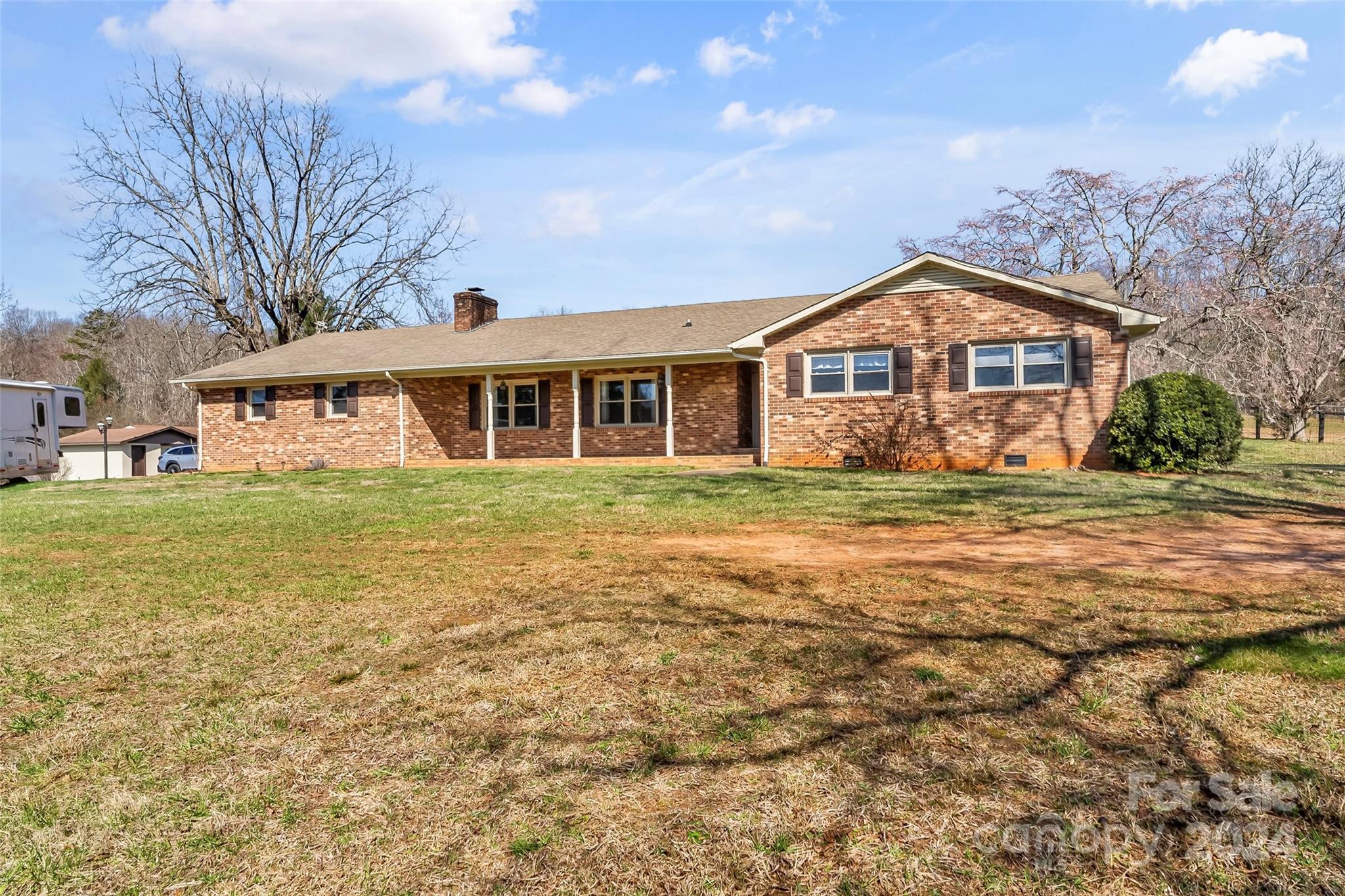 10845 Traphill Road Traphill, NC 28685 - Photo 6 of 48 a front view of a house with a yard