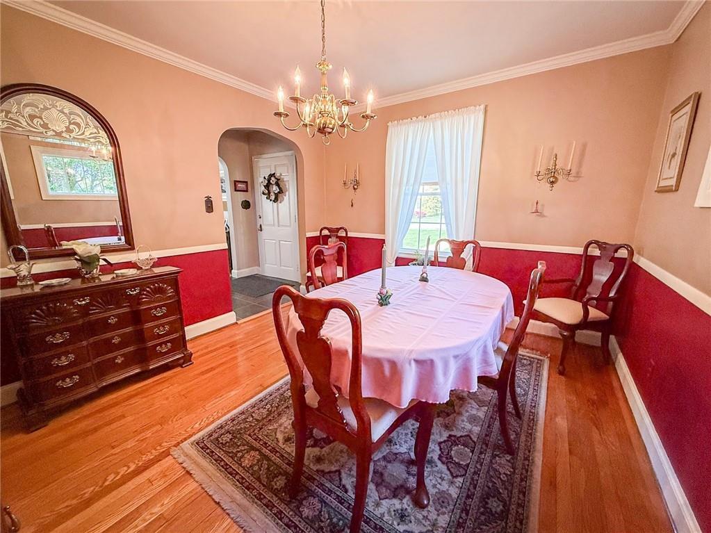306 Beechwood Boulevard Butler, PA 16001 - Photo 12 of 40 a view of a dining room with furniture and a chandelier