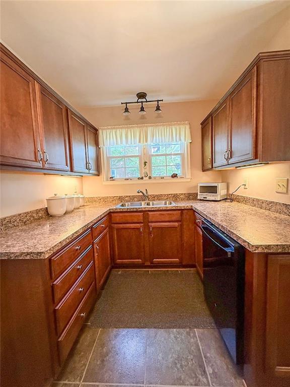 306 Beechwood Boulevard Butler, PA 16001 - Photo 15 of 40 a kitchen with a sink stove top oven and cabinets