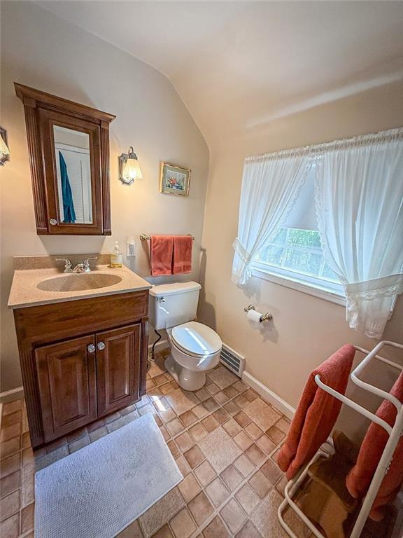 306 Beechwood Boulevard Butler, PA 16001 - Photo 25 of 40 a bathroom with a sink a toilet and mirror
