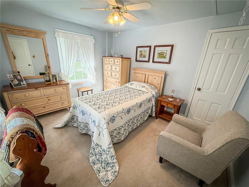 306 Beechwood Boulevard Butler, PA 16001 - Photo 27 of 40 a bedroom with a bed couch and window