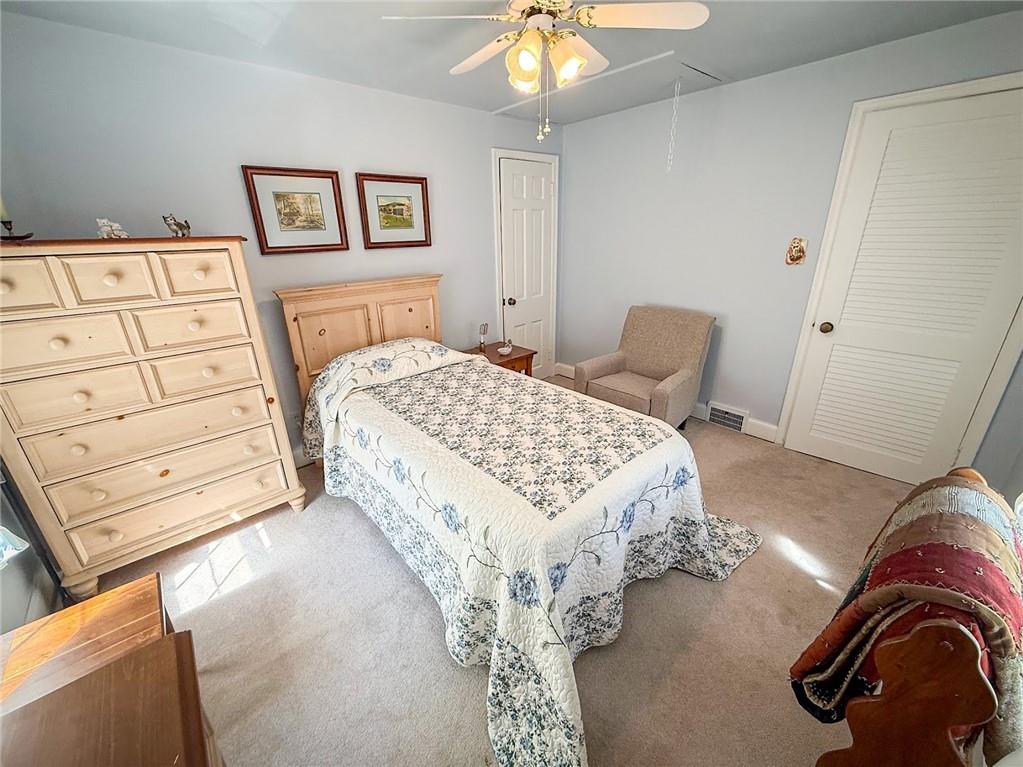 306 Beechwood Boulevard Butler, PA 16001 - Photo 28 of 40 a bedroom with a bed and a dresser