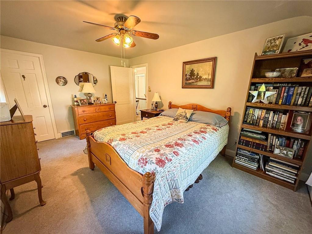 306 Beechwood Boulevard Butler, PA 16001 - Photo 31 of 40 a bed room with a bed and a book shelf