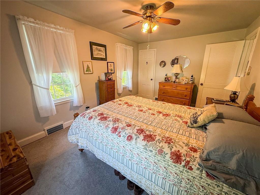 306 Beechwood Boulevard Butler, PA 16001 - Photo 32 of 40 a bedroom with a large bed and a window