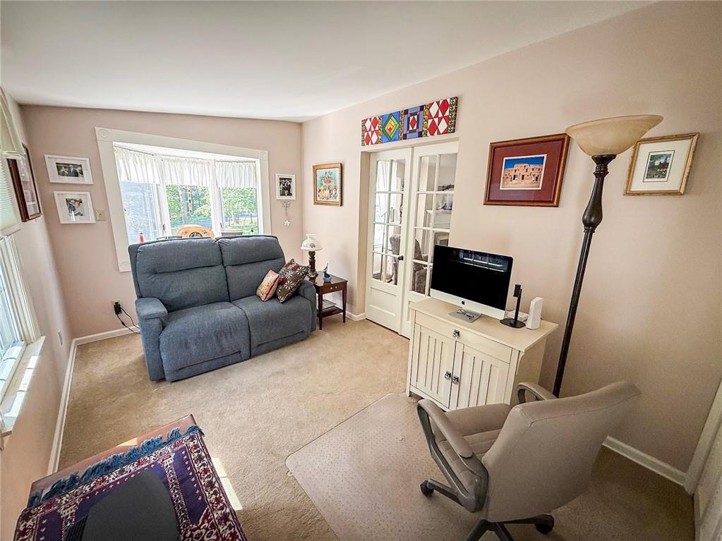 306 Beechwood Boulevard Butler, PA 16001 - Photo 8 of 40 a living room with furniture and a flat screen tv