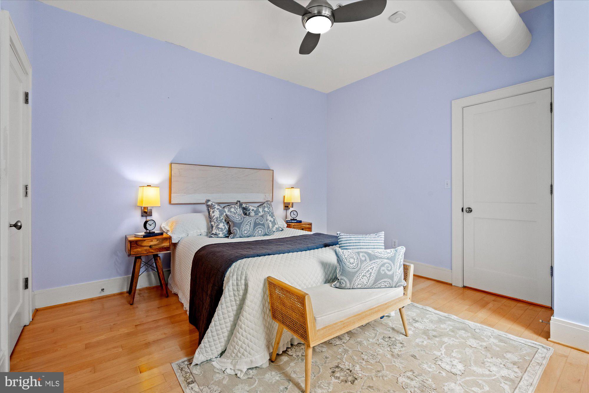 1817 Swann Street Northwest, Unit B Washington, DC 20009 - Photo 16 of 34 a bed room with a bed and a chair