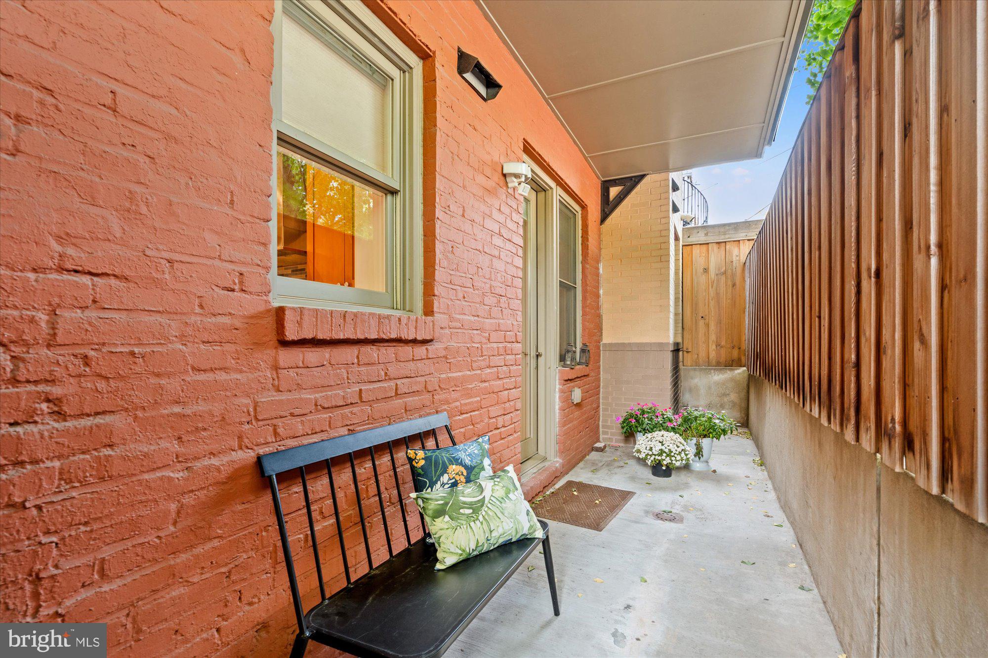 1817 Swann Street Northwest, Unit B Washington, DC 20009 - Photo 25 of 34 a view of an outdoor chairs and table in the balcony