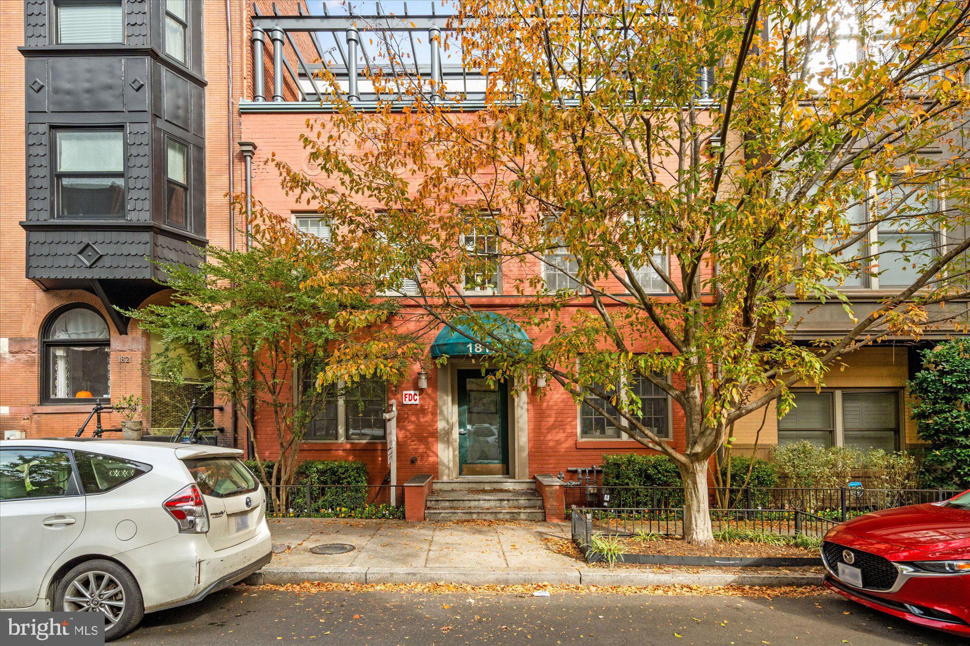 1817 Swann Street Northwest, Unit B Washington, DC 20009 - Photo 27 of 34 a car parked in front of a building