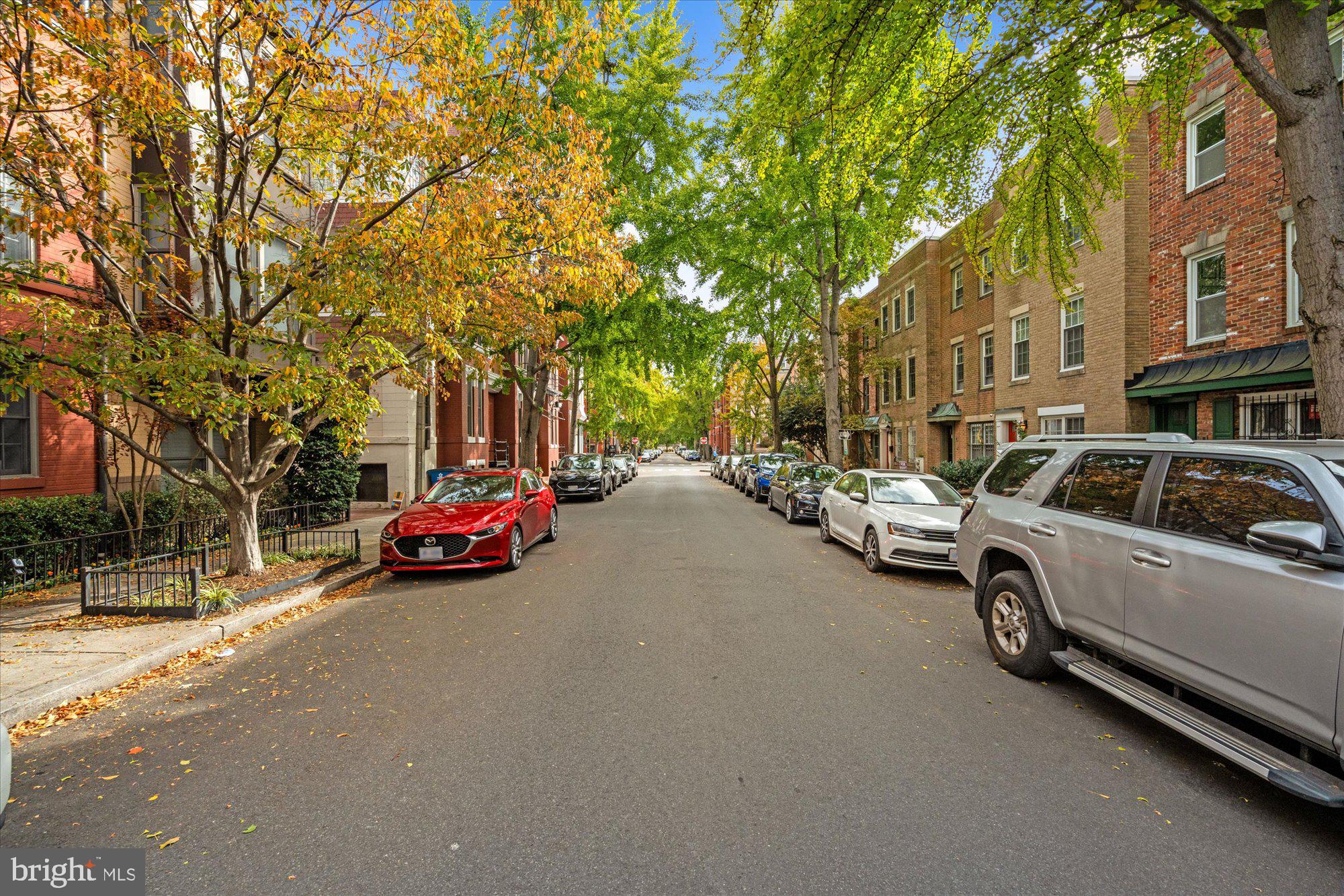 1817 Swann Street Northwest, Unit B Washington, DC 20009 - Photo 31 of 34 a view of street with parked cars