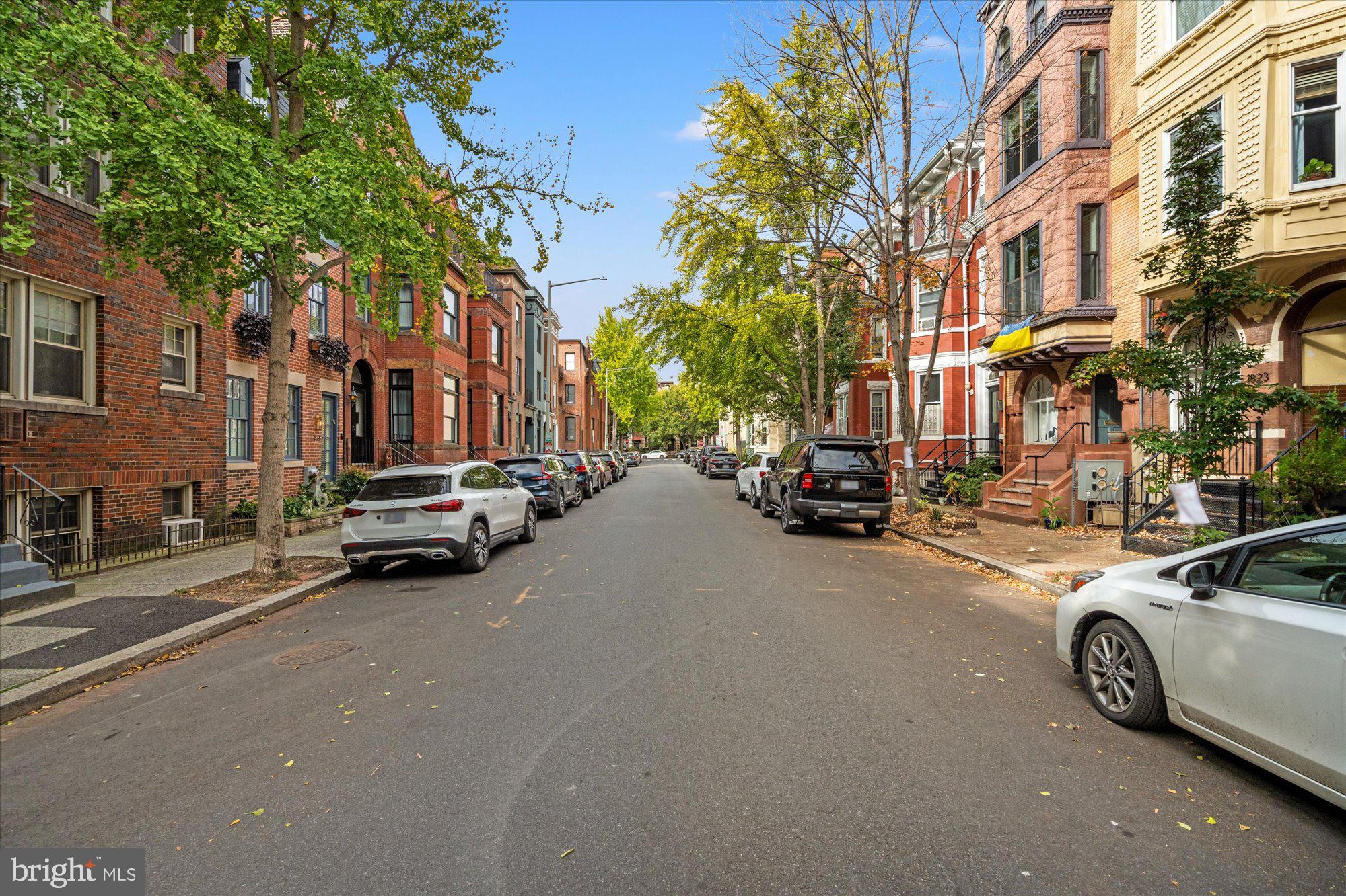 1817 Swann Street Northwest, Unit B Washington, DC 20009 - Photo 32 of 34 a view of a city street with tall buildings