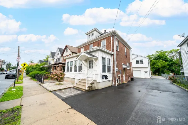 a view of a house with a street