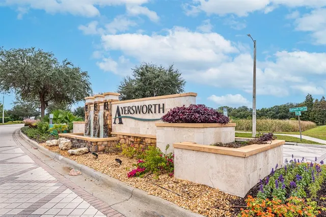 a view of a street with sitting area