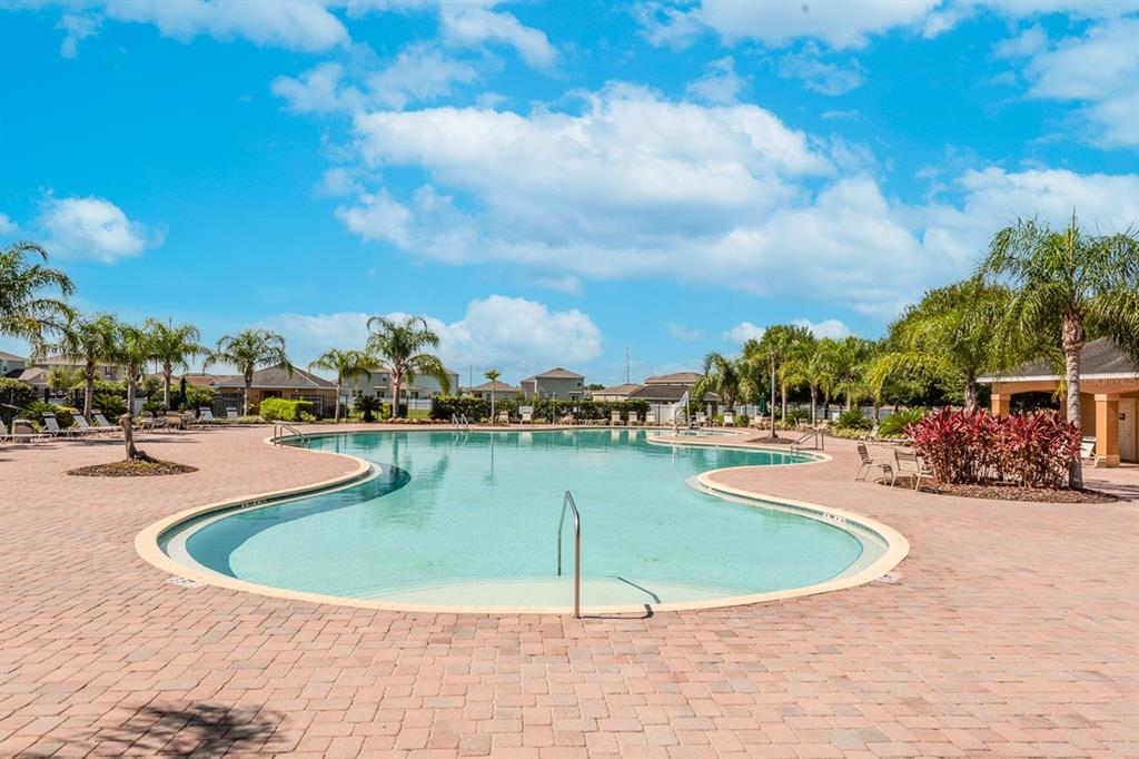 14510 Haddon Mist Drive Wimauma, FL 33598 - Photo 36 of 39 a view of a swimming pool with outdoor seating