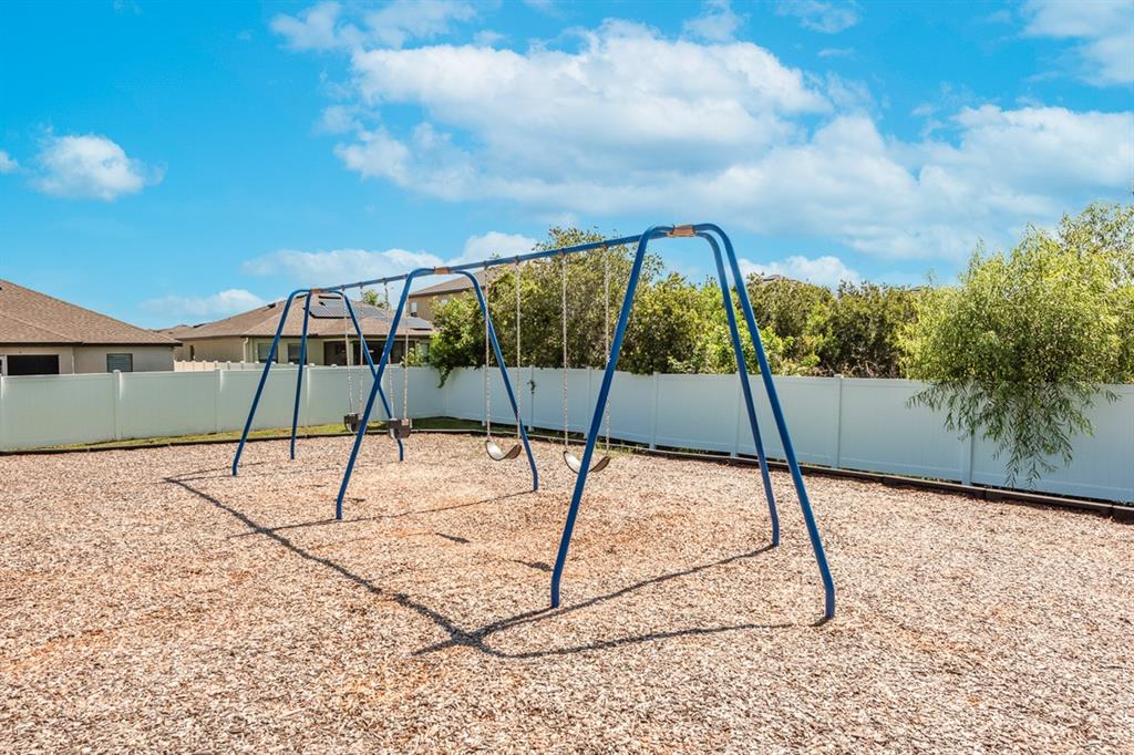 14510 Haddon Mist Drive Wimauma, FL 33598 - Photo 38 of 39 a view of an outdoor space with swings