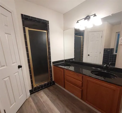 a view of a refrigerator in a kitchen