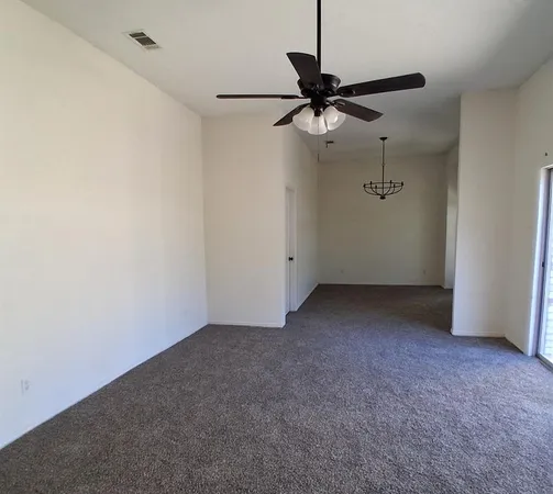 a view of a room with a fan