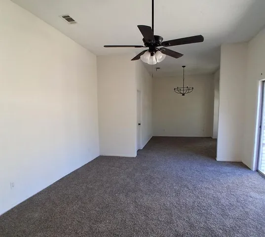 a view of a room with a fan