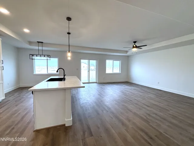 a view of a kitchen and a sink hardwood floor