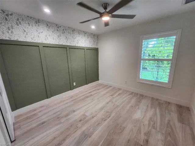 a bathroom with a shower curtain