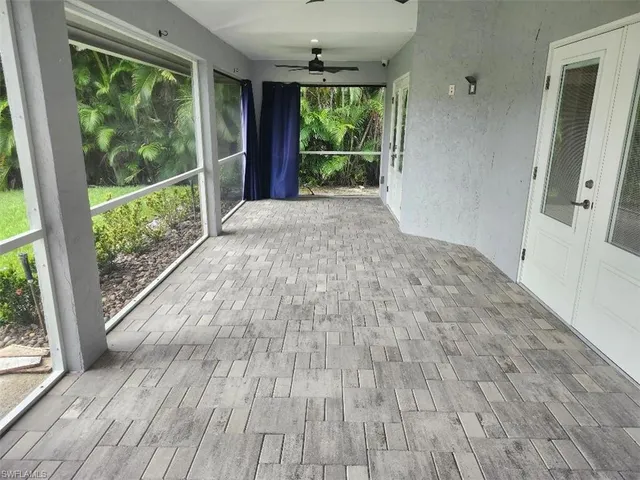 a view of storage and utility room with washer and dryer