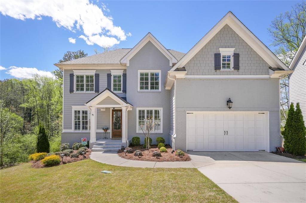 3998 Commodore Drive Chamblee, GA 30341 - Photo 1 of 1 a front view of a house with a yard
