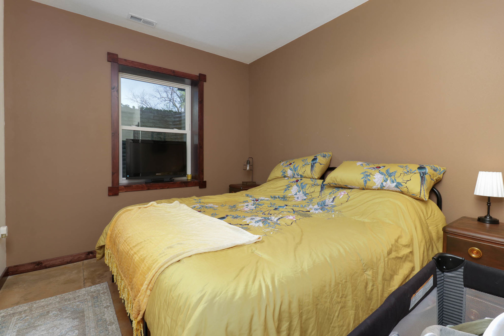 12014 Prairie Center Road Clinton, IL 61727 - Photo 31 of 56 a bed sitting in a bedroom next to a window