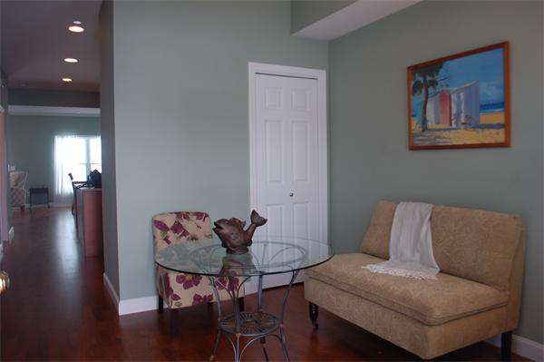 170 Beach Road, Unit MODEL Salisbury, MA 01952 - Photo 8 of 8 a view of a livingroom with furniture and wooden floor