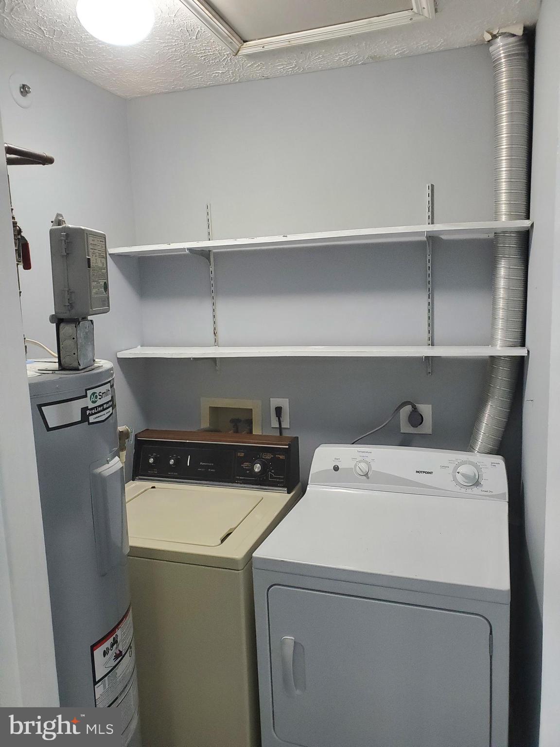 1304 Clover Valley Way, Unit K Edgewood, MD 21040 - Photo 9 of 10 a utility room with dryer washer and dryer