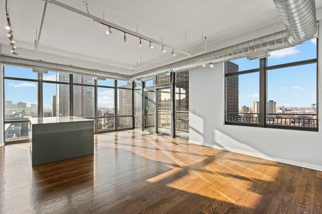 a view of a city with tall buildings