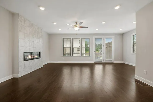 a view of balcony with wooden floor and fence