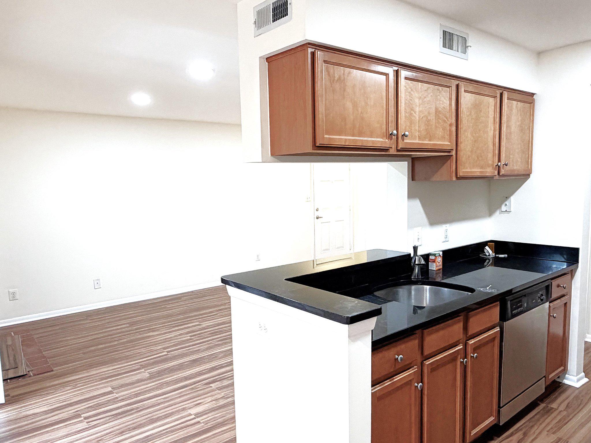 11653 Gas Light Court, Unit H Reston, VA 20190 - Photo 17 of 28 Modern kitchen w/ Granite Countertop & SS Appl