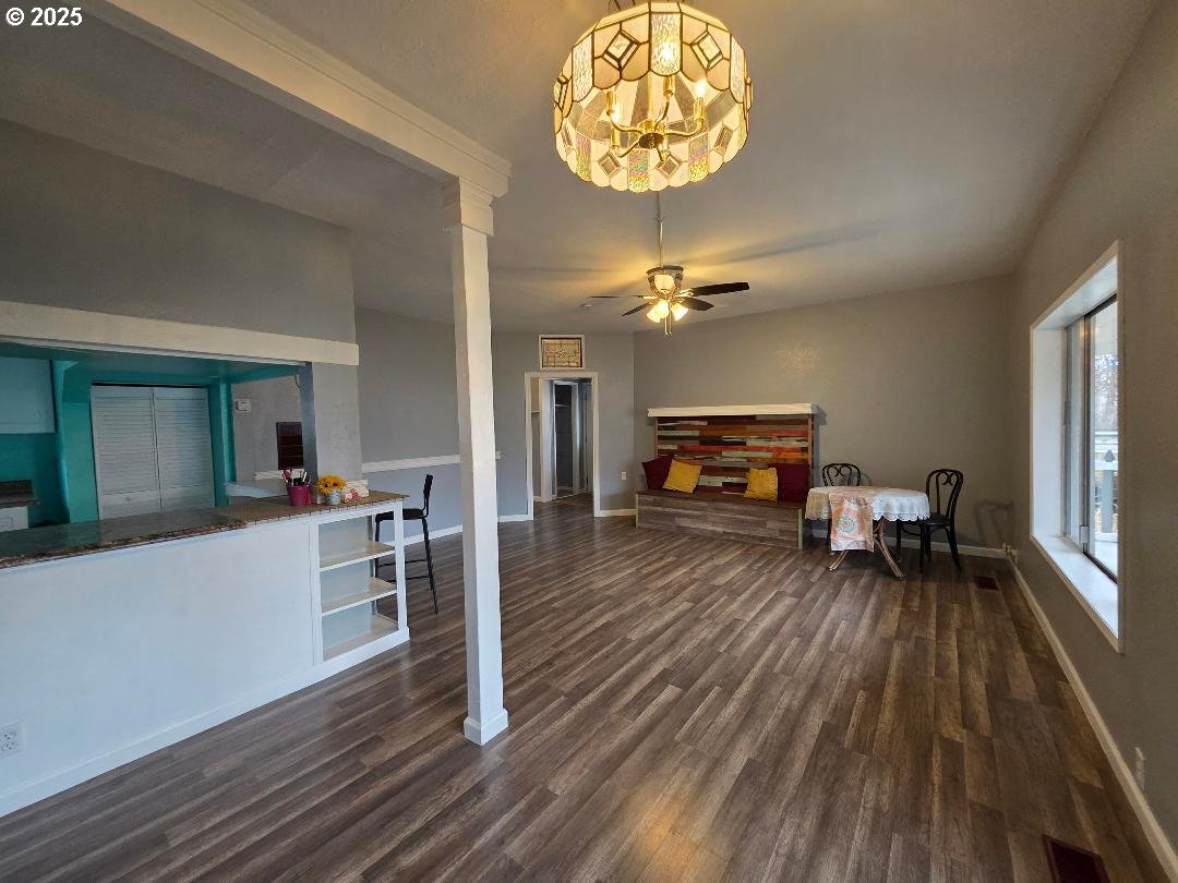 57036 Wamic Market Road Wamic, OR 97063 - Photo 6 of 31 a living room with furniture and a chandelier
