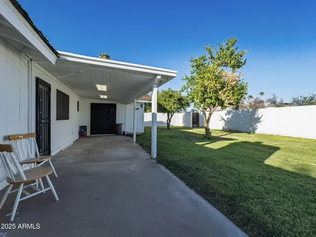 a view of a porch with a yard
