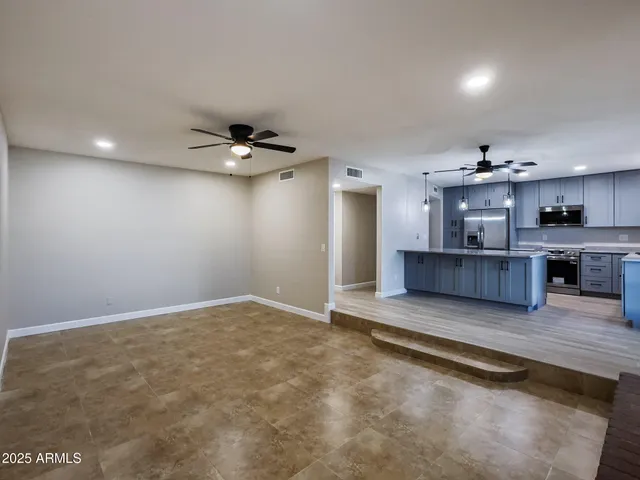 a view of kitchen and kitchen with sink