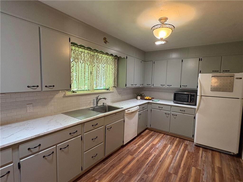 320 Cherry Hill Road Greenville, PA 16125 - Photo 11 of 38 a kitchen with sink cabinets and window