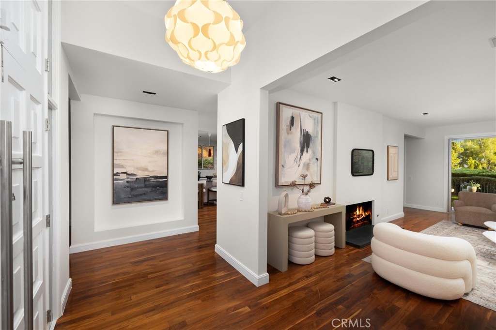 598 Camillo Road Sierra Madre, CA 91024 - Photo 7 of 75 a living room with furniture and a wooden floor