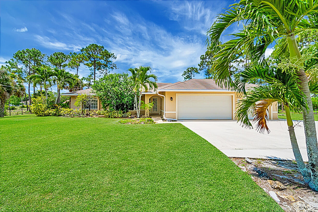 14324 76th Road North Loxahatchee, FL 33470 - Photo 2 of 45 14324 76th Rd N - Front of Home and Fenc