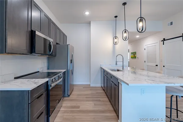 $450,000 | 700 Pershing Drive, Unit 202, Camdenton, MO 65020