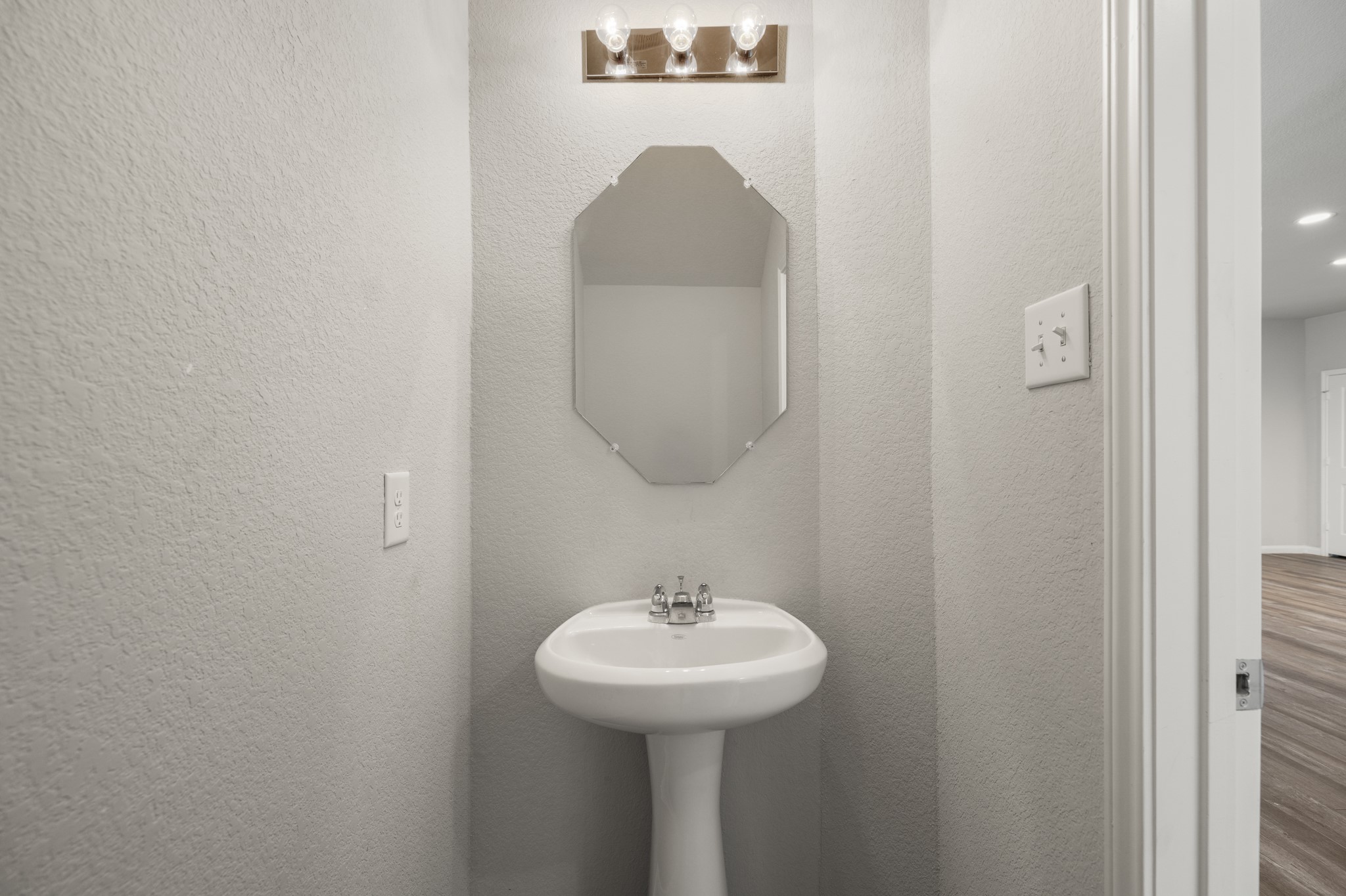 3571 Cannon Drive Conroe, TX 77301 - Photo 11 of 39 First level half bath