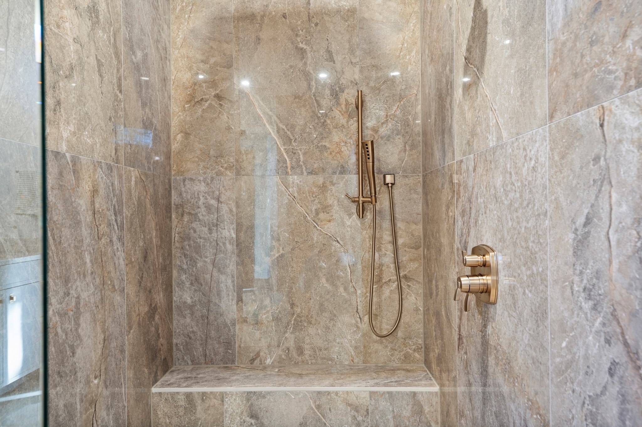 7706 Rutgers Avenue Austin, TX 78757 - Photo 13 of 35 Bathroom with a marble finish shower