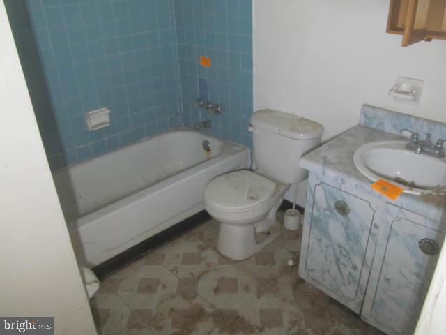 215 Andrew Road Coatesville, PA 19320 - Photo 8 of 8 a bathroom with a sink and a toilet