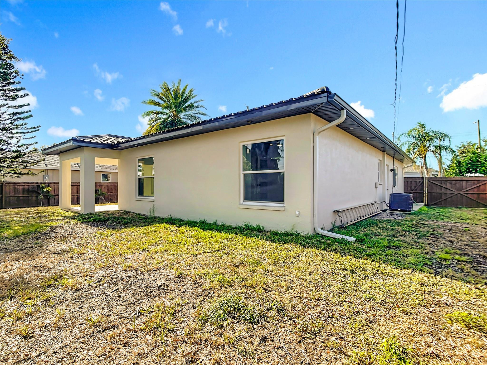 2565 Englewood Road Venice, FL 34293 - Photo 14 of 19 a house view with a backyard space