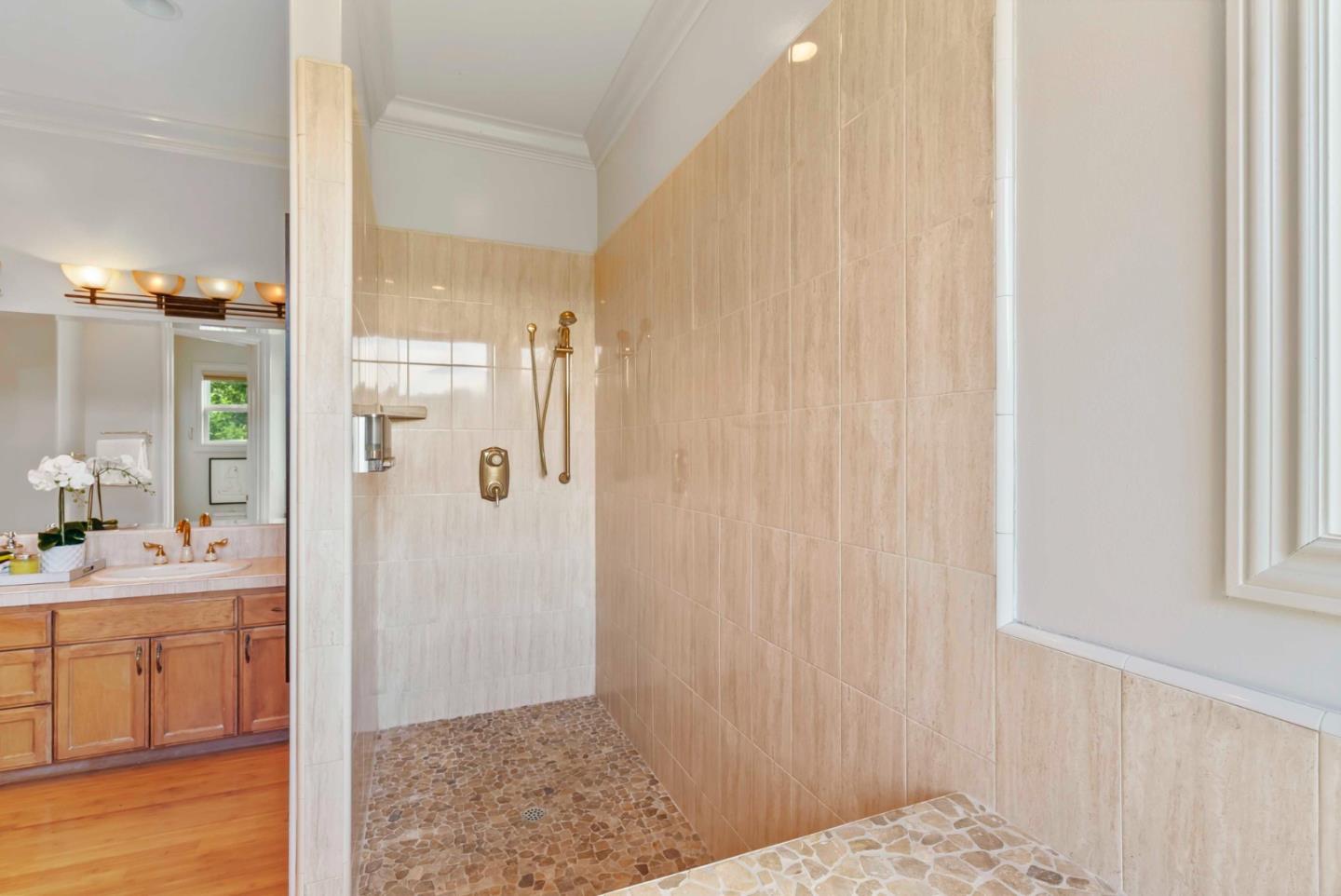 2390 Rockwood Ranch Road Morgan Hill, CA 95037 - Photo 66 of 92 a bathroom with a sink and a mirror