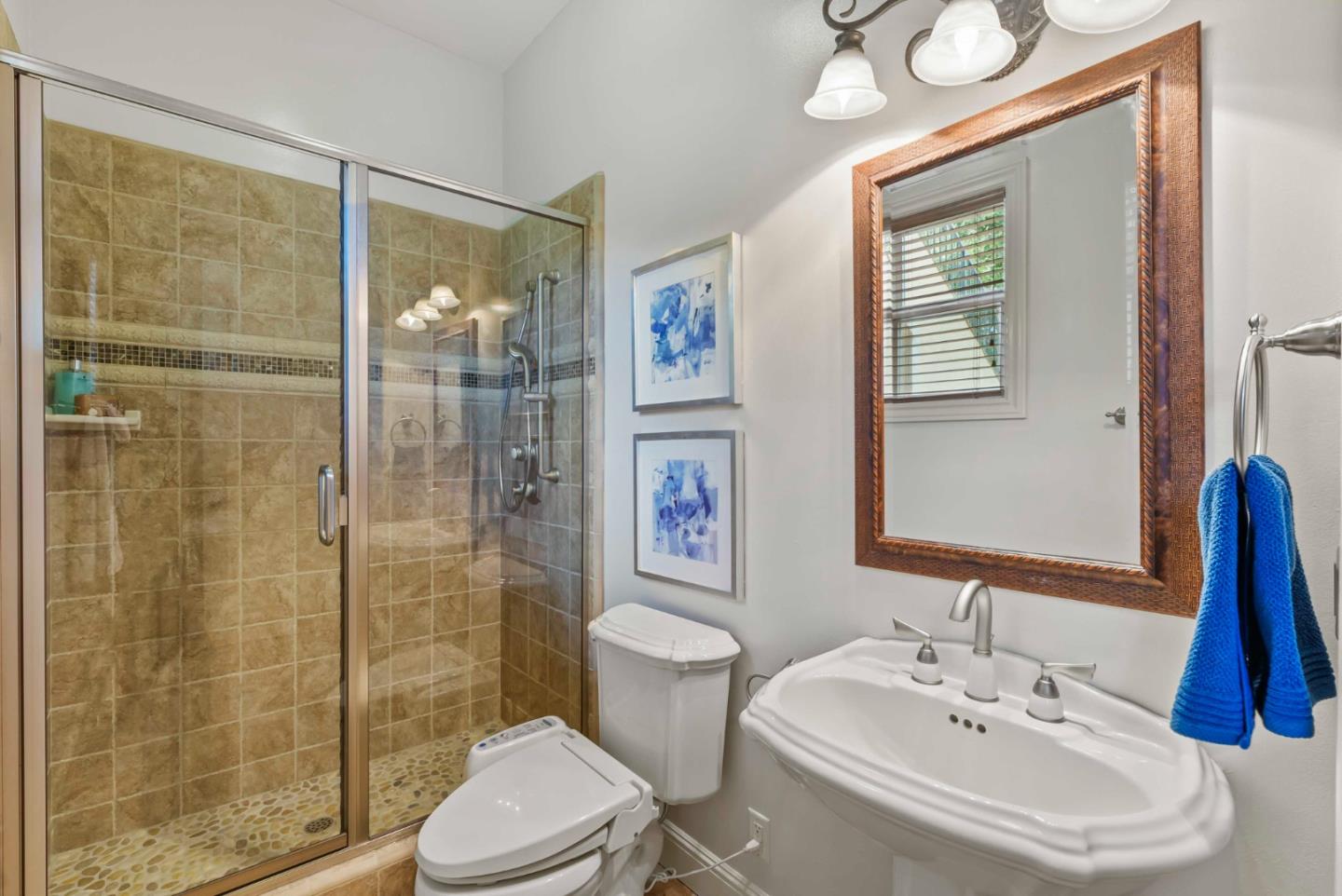 2390 Rockwood Ranch Road Morgan Hill, CA 95037 - Photo 68 of 92 a bathroom with a sink toilet and shower