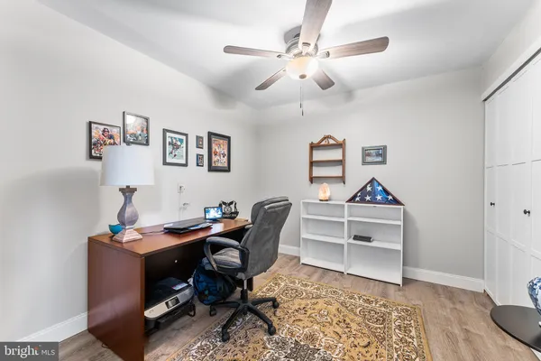 a workspace with furniture and window