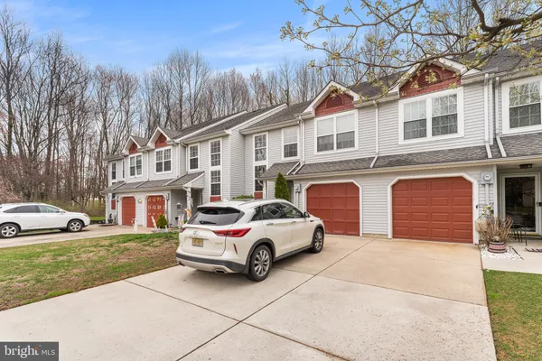 a car parked in front of a house
