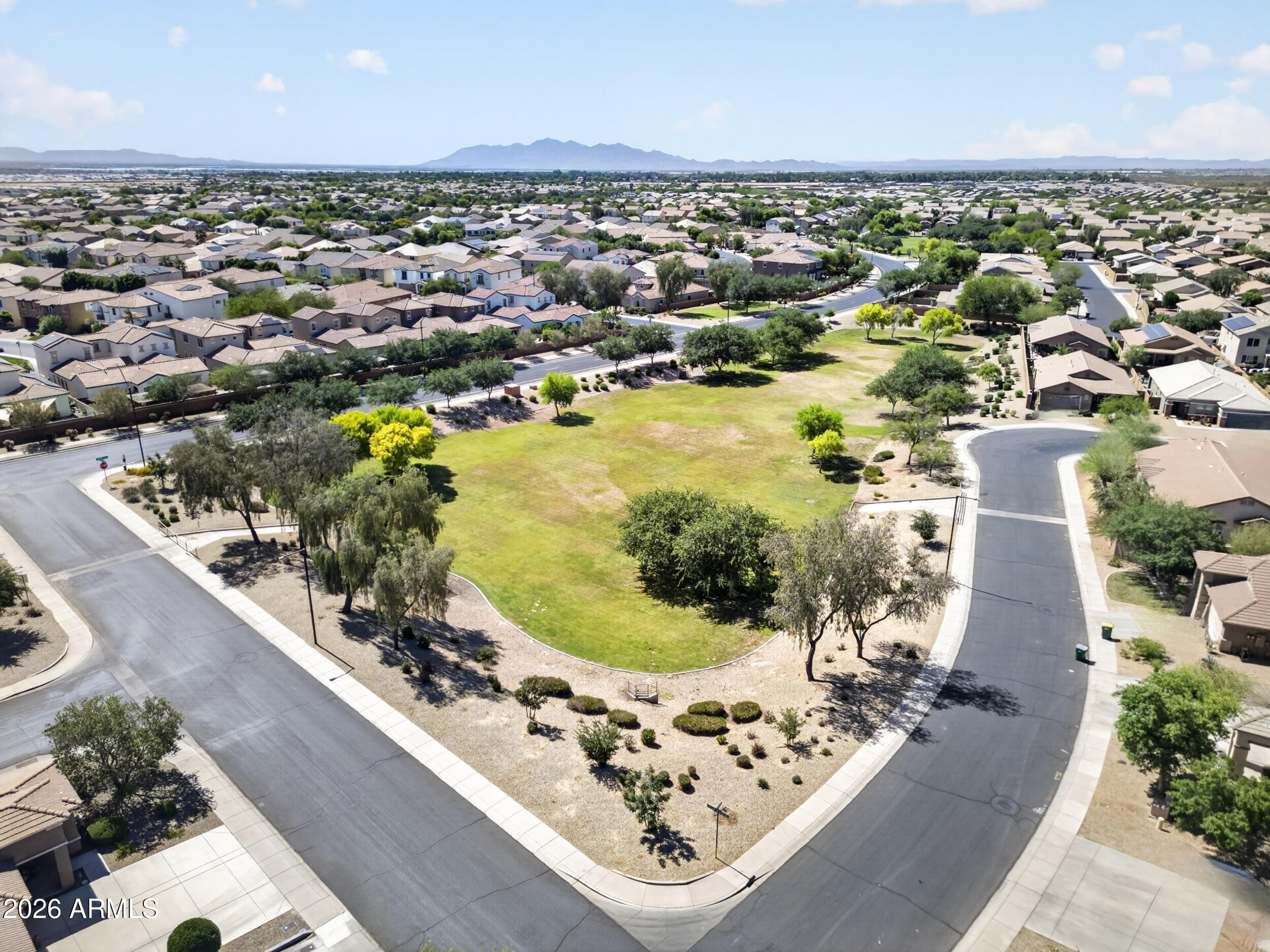 18612 West Mountain View Road Waddell, AZ 85355 - Photo 62 of 71 an aerial view of a house with a swimming pool
