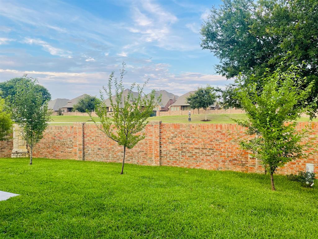 516 Angela Lane Euless, TX 76039 - Photo 34 of 39 View of yard with a residential view