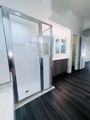 a view of entryway with wooden floor