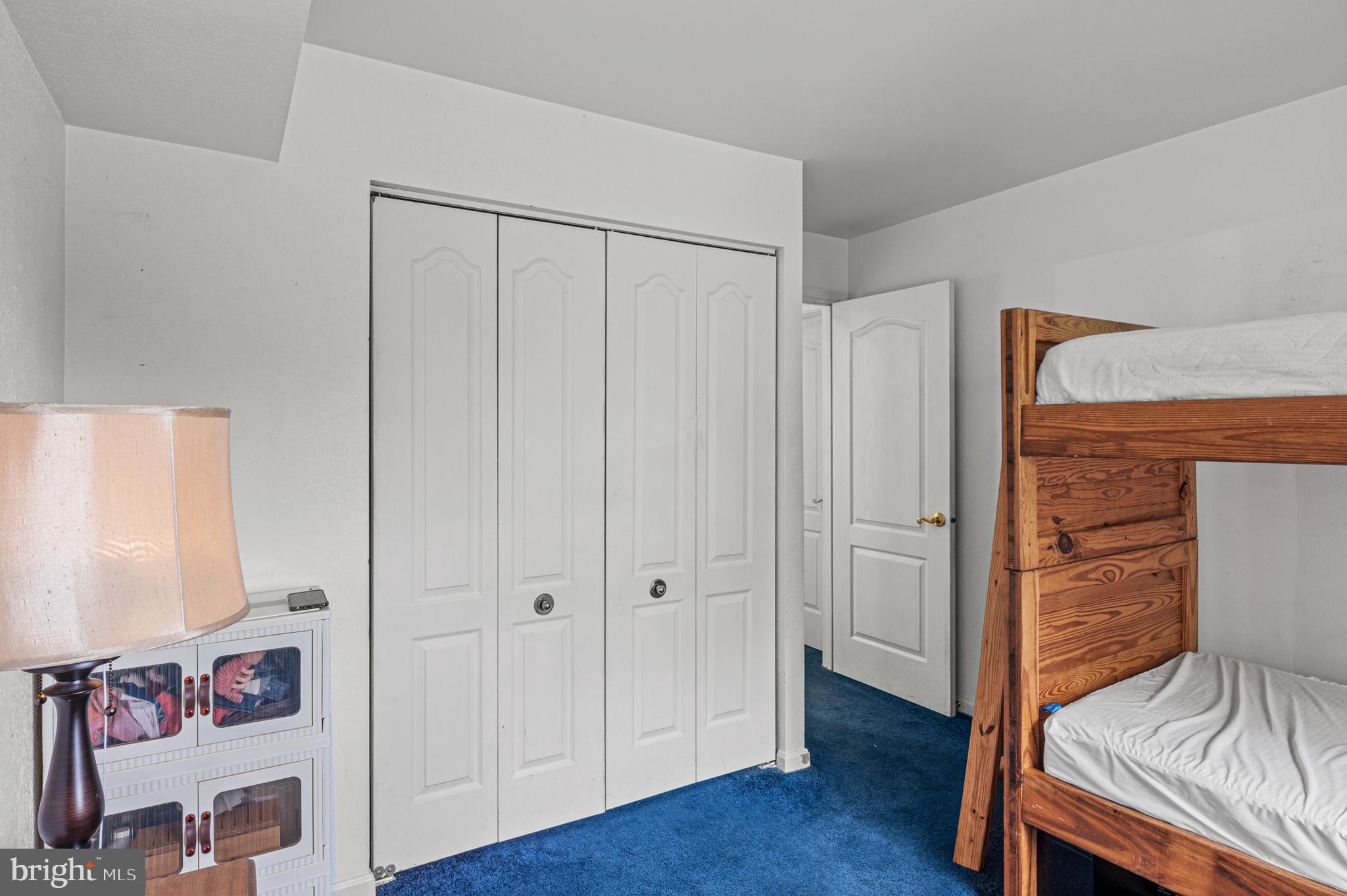 8559 Falls Run Road, Unit L Ellicott City, MD 21043 - Photo 20 of 28 a view of a hallway with wooden floor
